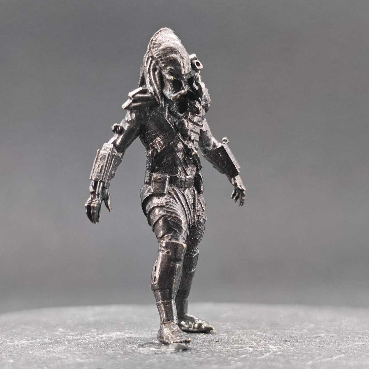 Brass Extraterrestrial Hunter Figurine — Sci-Fi Alien Warrior Desk Sculpture