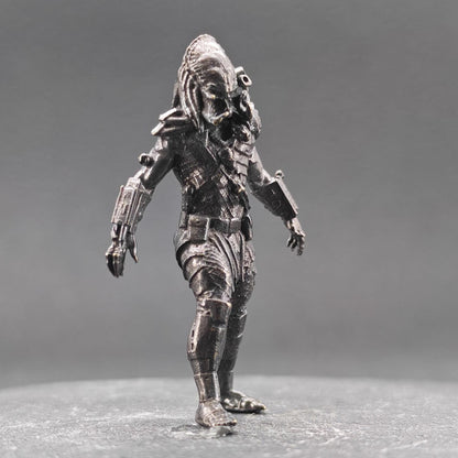 Brass Extraterrestrial Hunter Figurine — Sci-Fi Alien Warrior Desk Sculpture