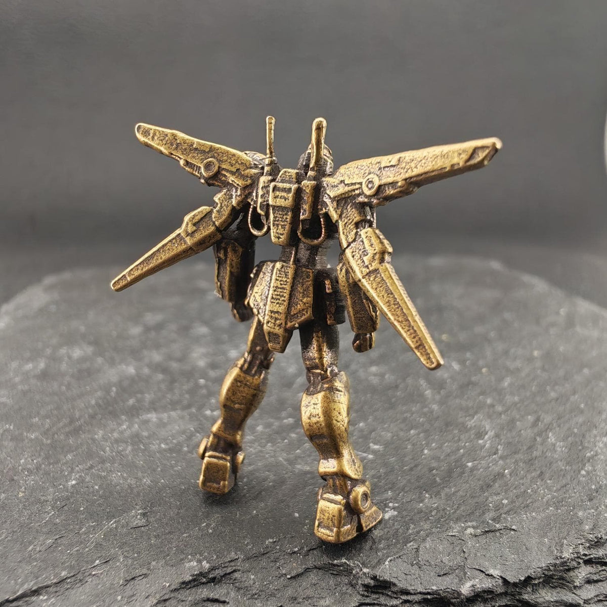 Brass Winged Mobile Suit Micro Figurine — Sci-Fi Mecha Diorama & Terrarium Sculpture