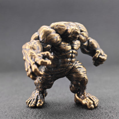 Brass Muscle Monster Figurine — Man Holding a Giant Brass Sculpture & Fantasy Desk Piece