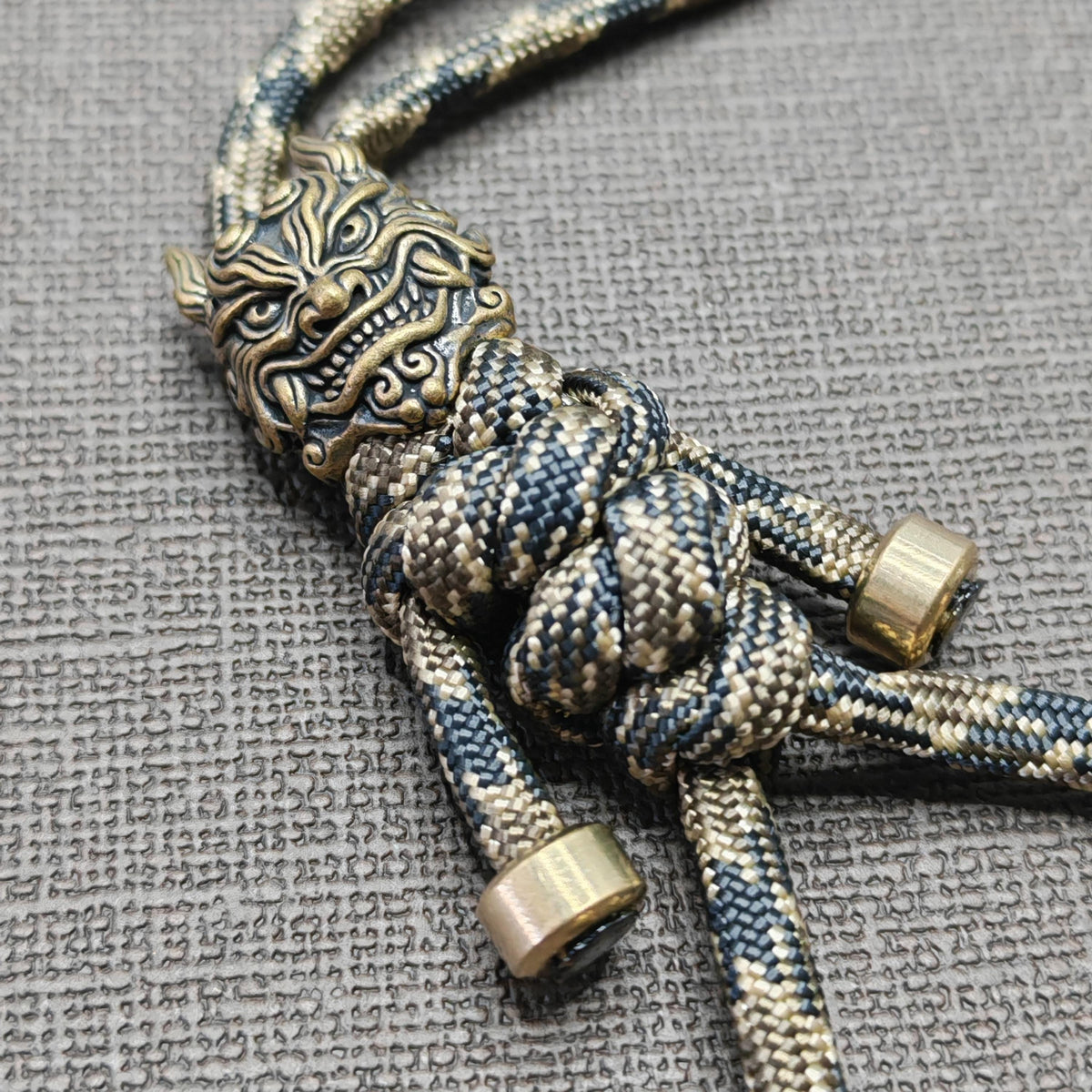 Brass Mythical Mask Paracord Keychain — EDC Backpack Charm & Car Ornament