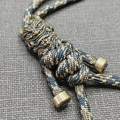 Brass Mythical Mask Paracord Keychain — EDC Backpack Charm & Car Ornament