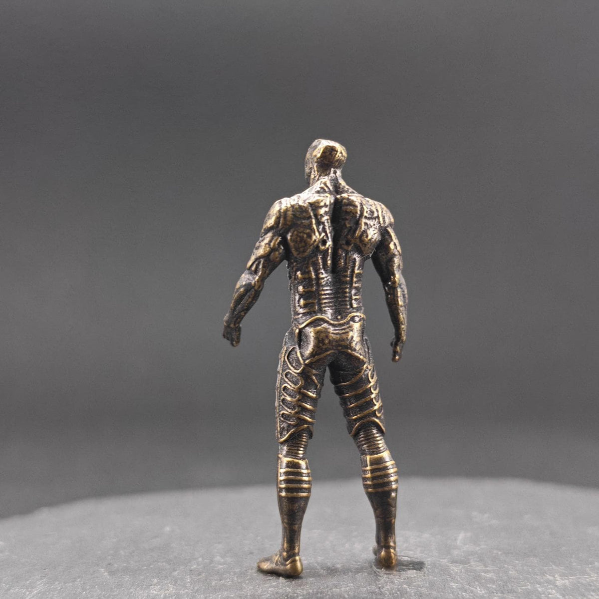 Brass Engineer Figurine — Biomechanical Alien Desk Sculpture