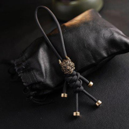 Brass Mythical Mask Paracord Keychain — EDC Backpack Charm & Car Ornament