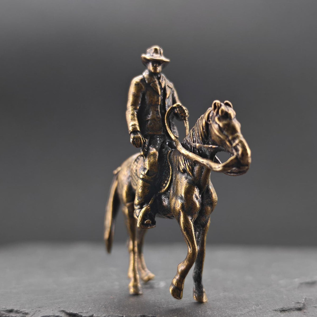Brass Cowboy on Horseback Figurine — Polished Western Desk Sculpture & Miniature Collector Piece