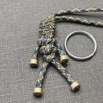 Brass Mythical Mask Paracord Keychain — EDC Backpack Charm & Car Ornament