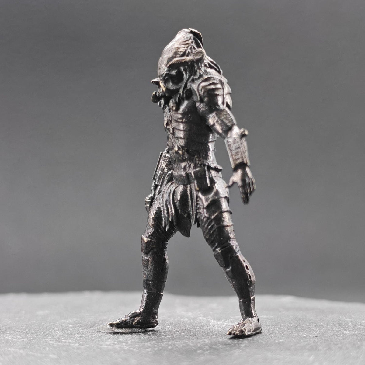 Brass Extraterrestrial Hunter Figurine — Sci-Fi Alien Warrior Desk Sculpture