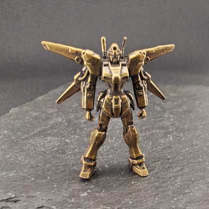 Brass Winged Mobile Suit Micro Figurine — Sci-Fi Mecha Diorama & Terrarium Sculpture