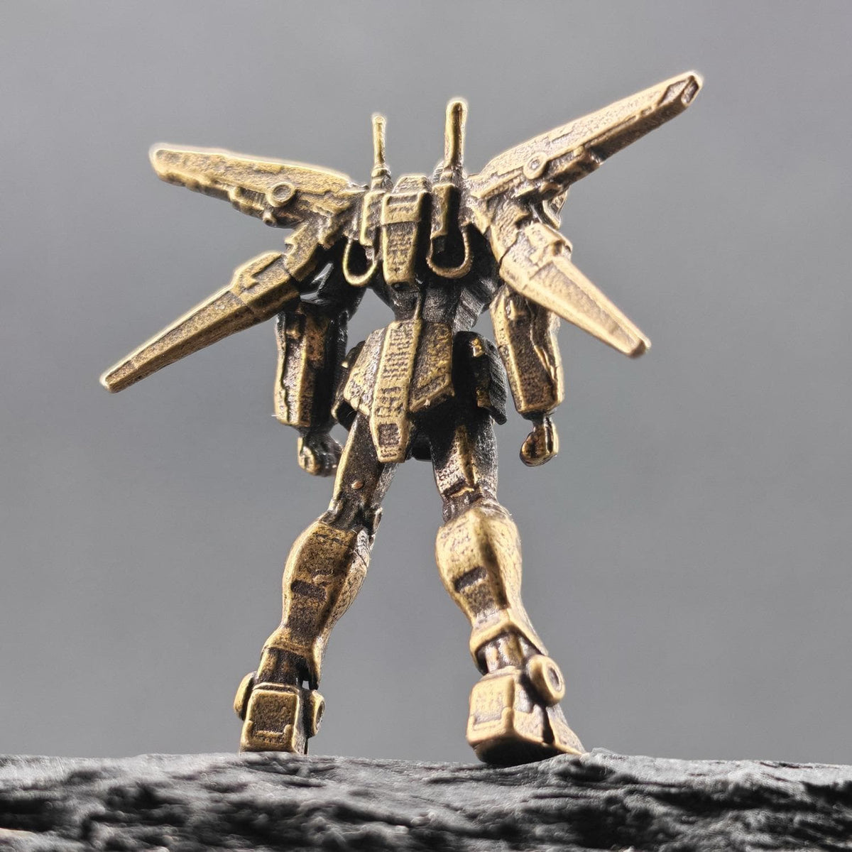 Brass Winged Mobile Suit Micro Figurine — Sci-Fi Mecha Diorama & Terrarium Sculpture