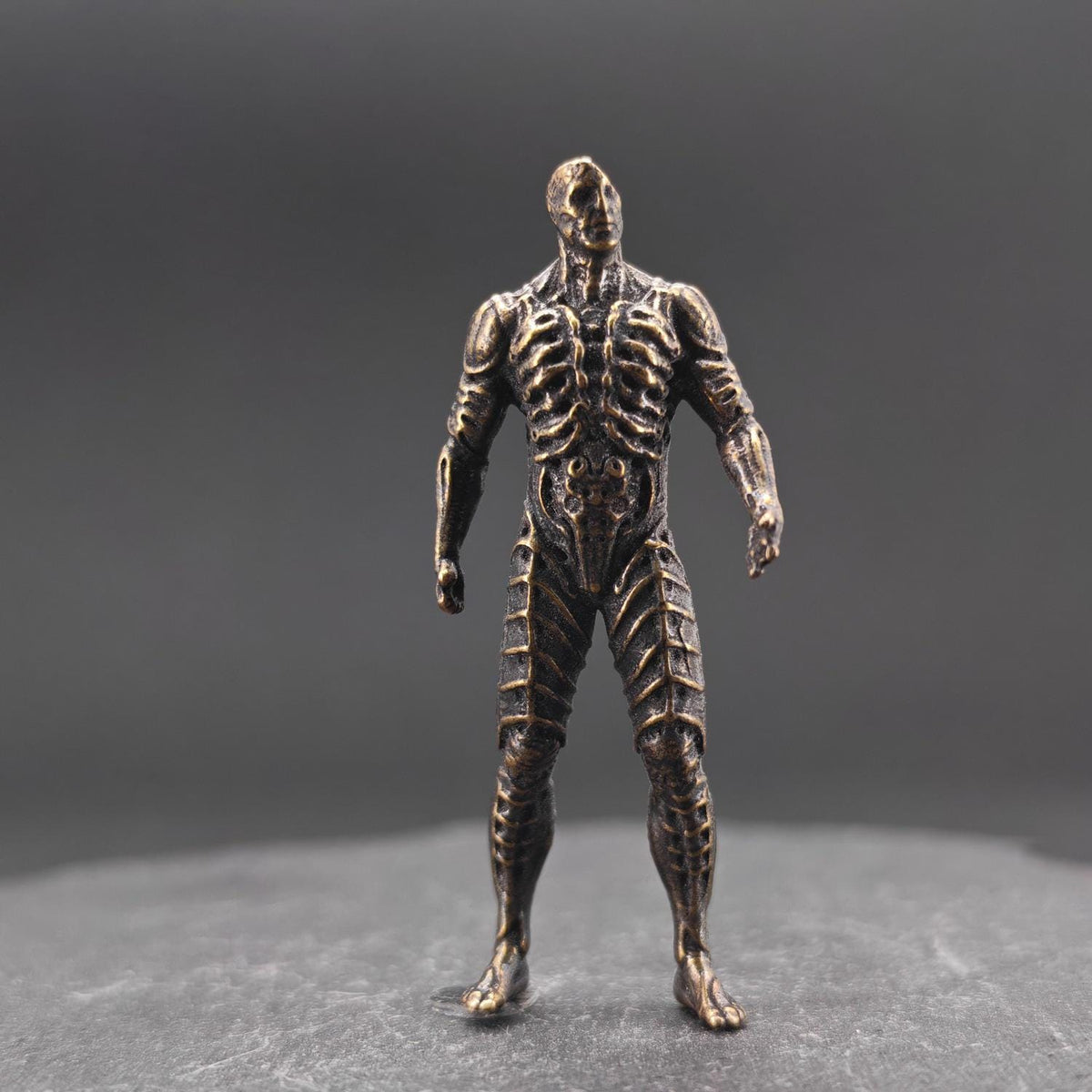 Brass Engineer Figurine — Biomechanical Alien Desk Sculpture