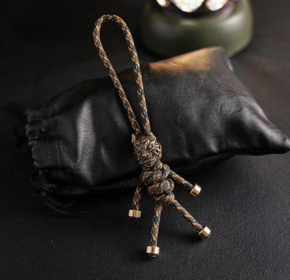 Brass Mythical Mask Paracord Keychain — EDC Backpack Charm & Car Ornament