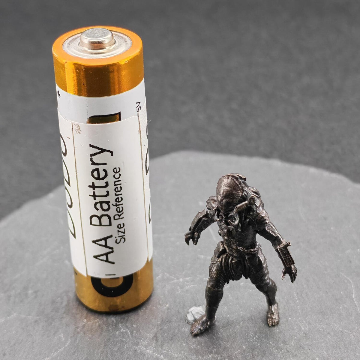 Brass Extraterrestrial Hunter Figurine — Sci-Fi Alien Warrior Desk Sculpture