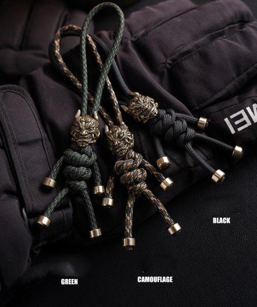 Brass Mythical Mask Paracord Keychain — EDC Backpack Charm & Car Ornament