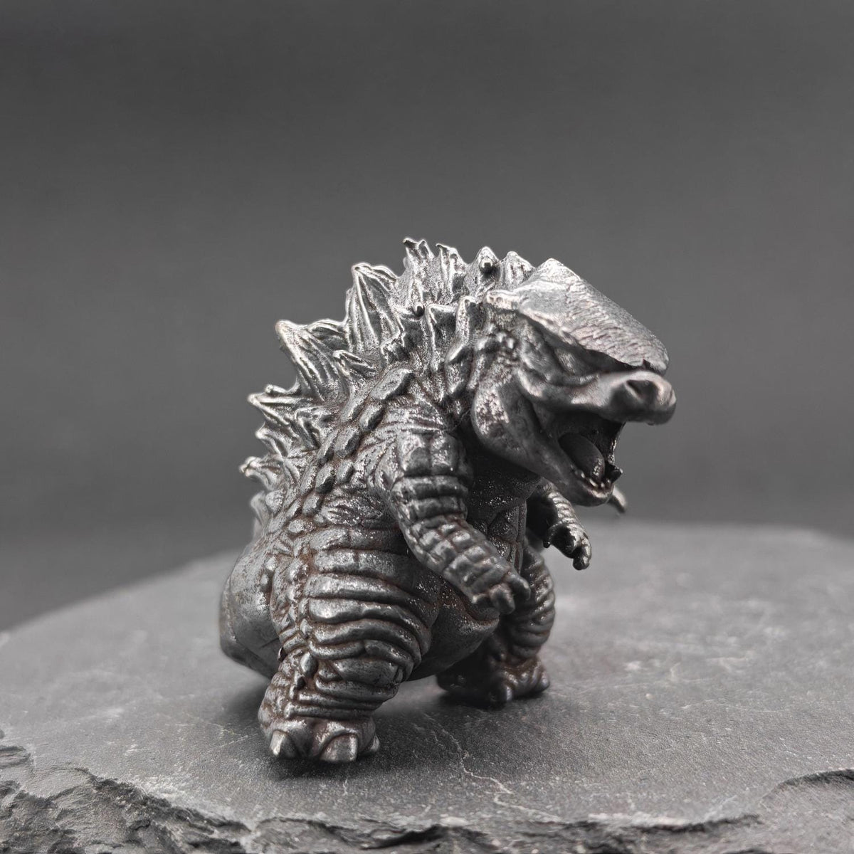 Chubby Brass Kaiju Figurine — Oxidised Black Monster Desk Sculpture & Collector Piece