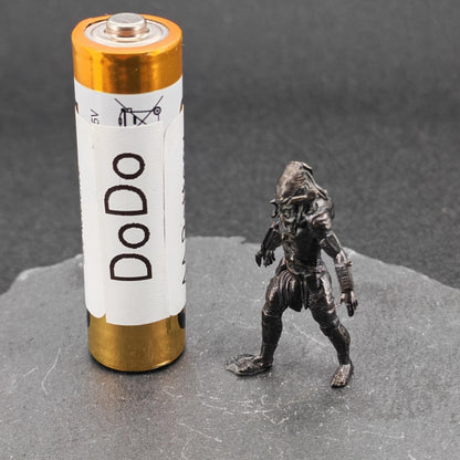 Brass Extraterrestrial Hunter Figurine — Sci-Fi Alien Warrior Desk Sculpture