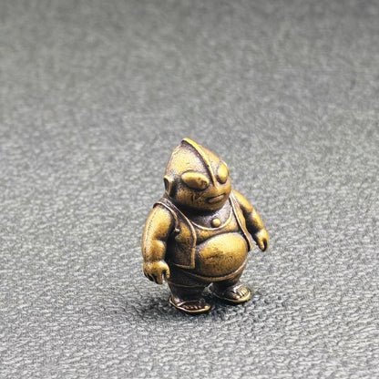 Brass Chubby Retired Hero Figurine — Parody Superhero Miniature & Novelty Desk Ornament