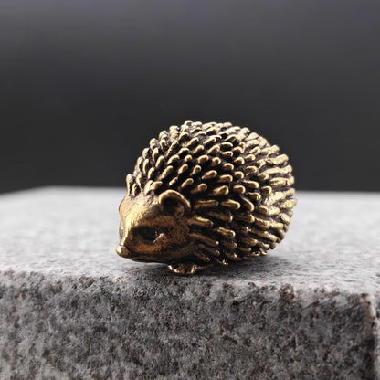 Brass Hedgehog Figurine with Flower – Miniature Collectible Desk Ornament